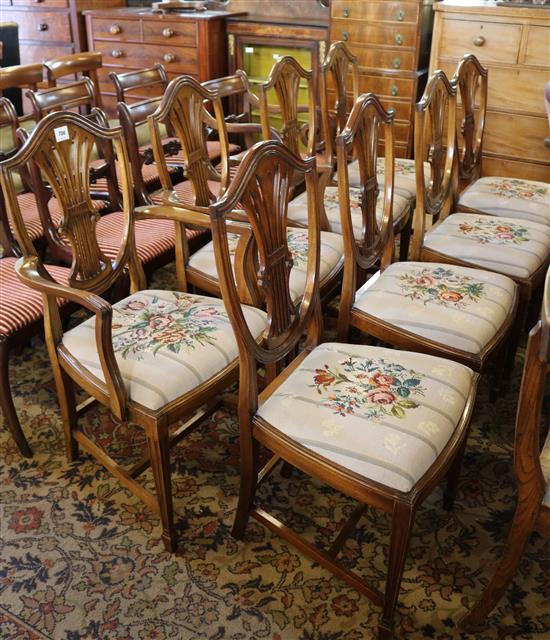 A set of 8 Hepplewhite style dining chairs